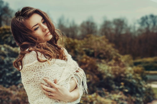 A woman hugging herself